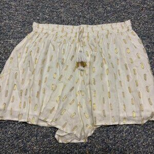 Women’s shorts Surf Gypsy size large gold and white